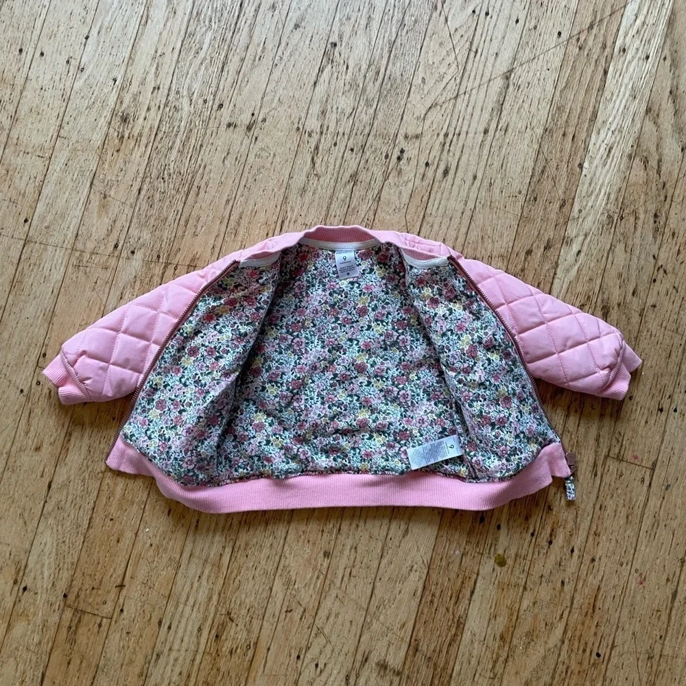 Quilted coat with floral details